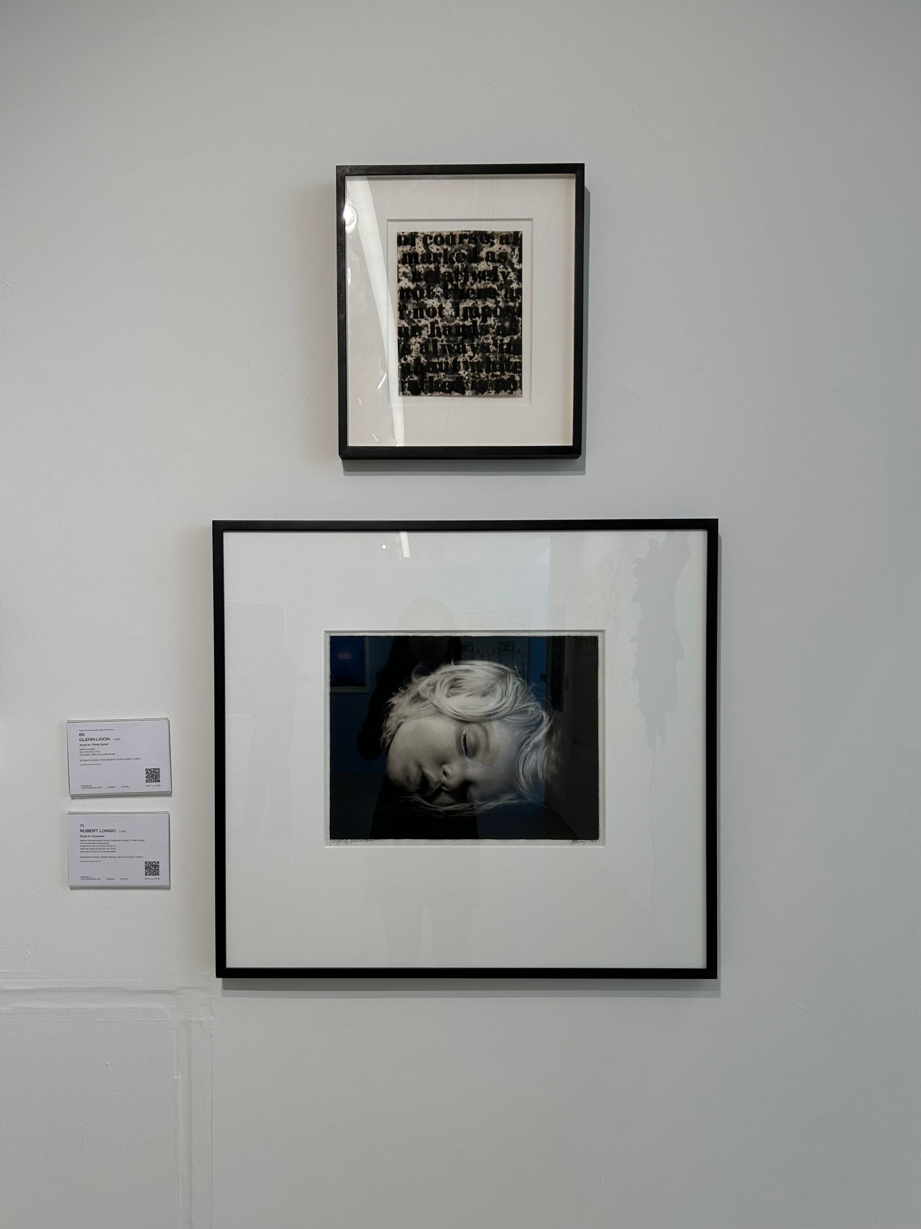 Glenn Ligon, Study for “White Series” (1995). Installation view, with the work hanging above another framed work.